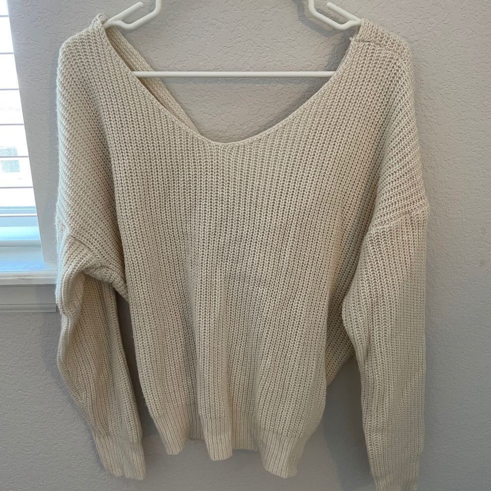 Cream knotted sweater